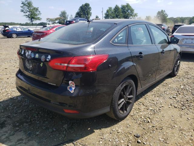 Photo 4 from auction – 2015 FORD FOCUS SE with VIN 1FADP3F22FL330193