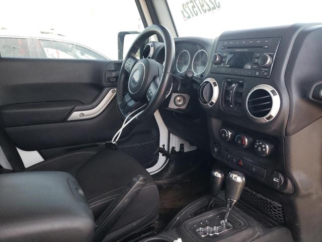 Photo 9 from auction – 2016 JEEP WRANGLER U with VIN 1C4BJWEG1GL115911