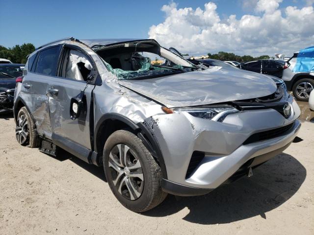 TOYOTA RAV4 LE 2018 with VIN 2T3ZFREV3JW465500 - Photo from auction