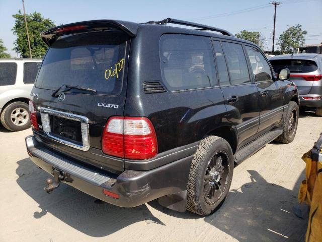 Photo 4 from auction – 2003 LEXUS LX 470 with VIN JTJHT00W133527656