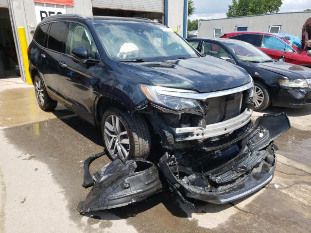 HONDA PILOT TOUR 2016 with VIN 5FNYF6H93GB125707 - Photo from auction