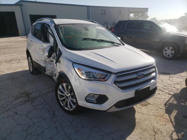FORD ESCAPE TIT 2017 with VIN 1FMCU0J97HUB72363 - Photo from auction