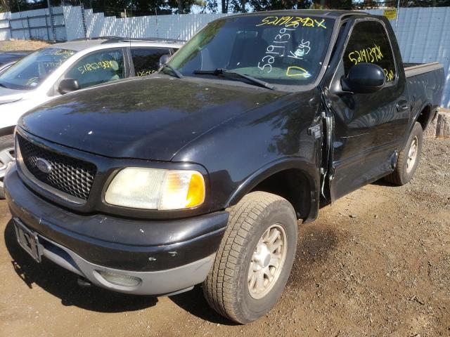Photo 2 from auction – 2002 FORD F150 with VIN 1FTRF18L02NB79351