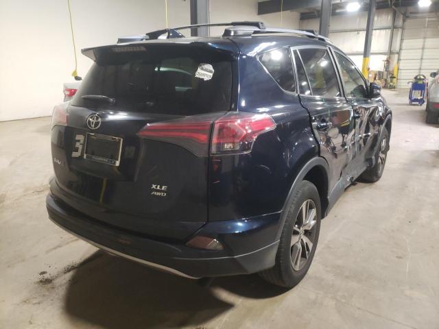 Photo 4 from auction – 2017 TOYOTA RAV4 XLE with VIN JTMRFREV0HJ160898