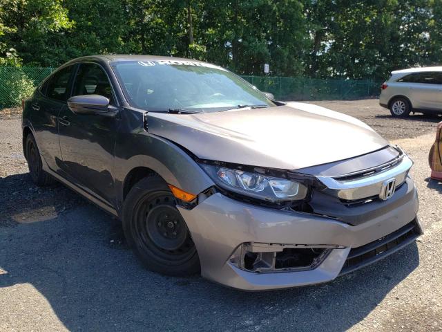 HONDA CIVIC LX 2018 with VIN 19XFC2F51JE018256 - Photo from auction