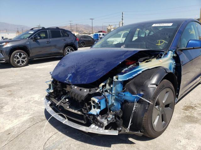 Photo 9 from auction – 2021 TESLA MODEL 3 with VIN 5YJ3E1EA6MF068879