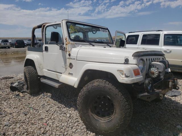 JEEP WRANGLER / 2002 with VIN 1J4FA59S82P702242 - Photo from auction