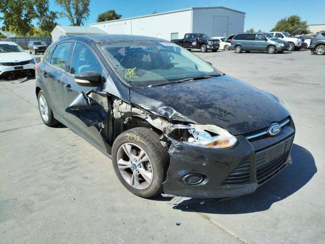 FORD FOCUS SE 2014 with VIN 1FADP3K26EL132320 - Photo from auction