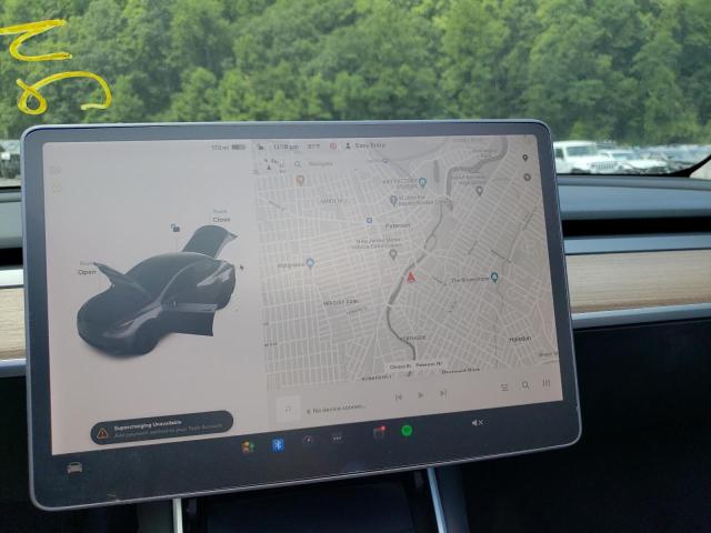 Photo 9 from auction – 2021 TESLA MODEL Y with VIN 5YJYGDEE5MF115324