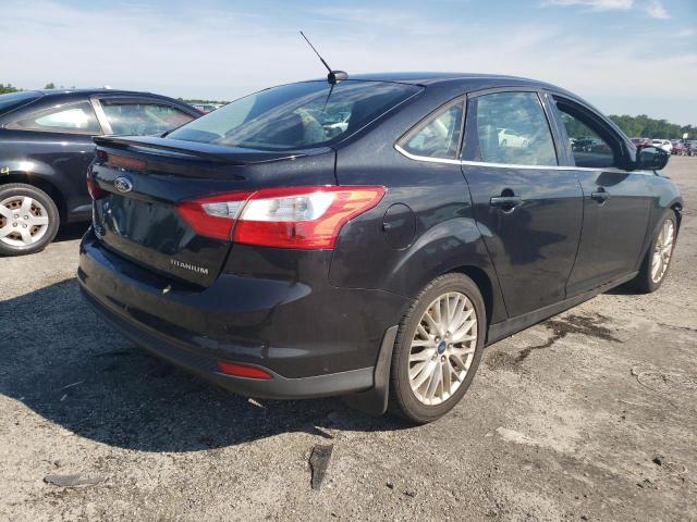 Photo 4 from auction – 2014 FORD FOCUS TITA with VIN 1FADP3J22EL159984