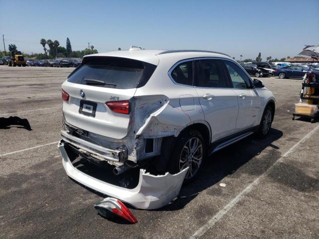 Photo 4 from auction – 2016 BMW X1 XDRIVE2 with VIN WBXHT3C34GP885602