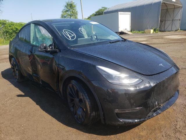 TESLA MODEL Y 2022 with VIN 7SAYGDEF6NF391542 - Photo from auction