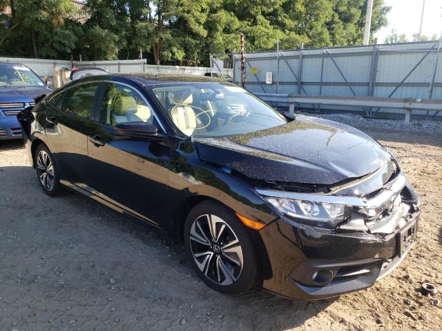 HONDA CIVIC EXL 2018 with VIN JHMFC1F77JX016506 - Photo from auction