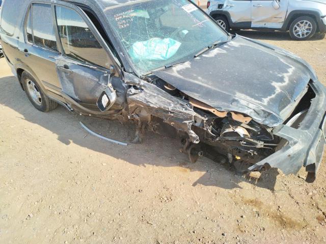 Photo 9 from auction – 2004 HONDA CR-V LX with VIN JHLRD68484C002463