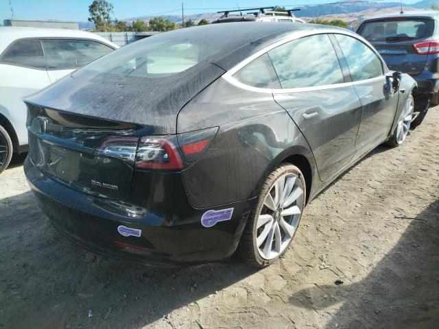 Photo 4 from auction – 2018 TESLA MODEL 3 with VIN 5YJ3E1EB9JF082389