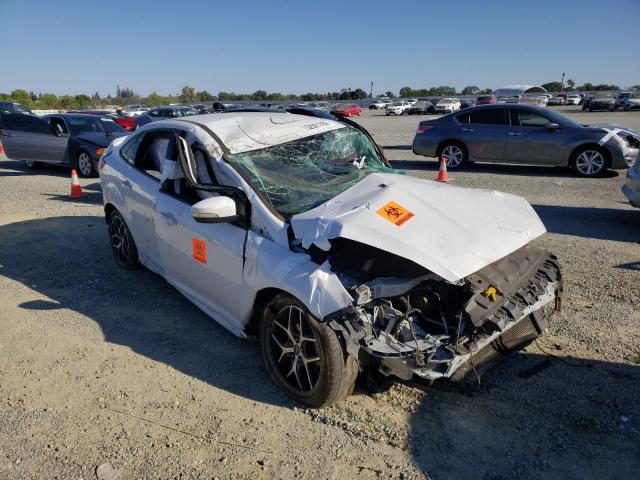 FORD FOCUS SE 2016 with VIN 1FADP3F27GL363269 - Photo from auction