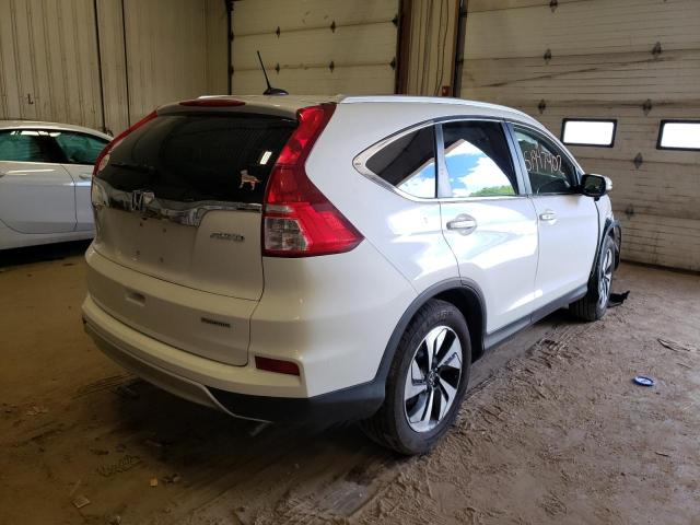 Photo 4 from auction – 2015 HONDA CR-V TOURI with VIN 5J6RM4H96FL028067