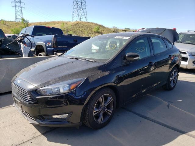 Photo 2 from auction – 2018 FORD FOCUS SE with VIN 1FADP3F2XJL228875
