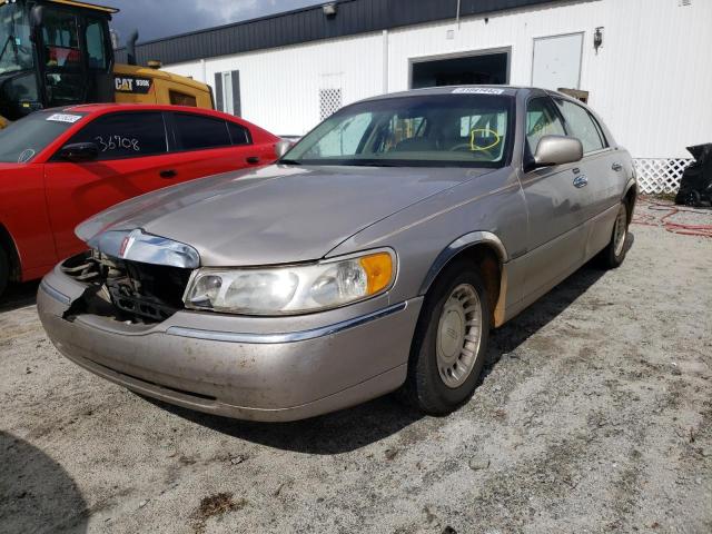 Photo 2 from auction – 2000 LINCOLN TOWN CAR E with VIN 1LNHM81W8YY815774
