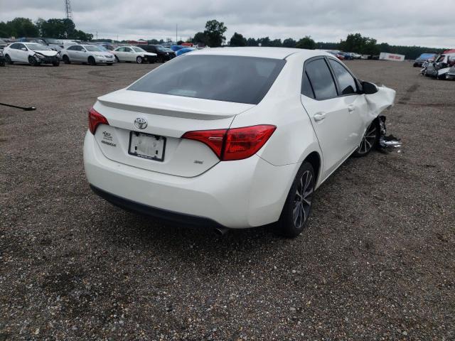 Photo 4 from auction – 2018 TOYOTA COROLLA L with VIN 5YFBURHE5JP773443