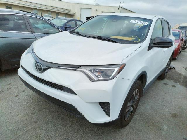 Photo 2 from auction – 2018 TOYOTA RAV4 LE with VIN 2T3ZFREV4JW424924