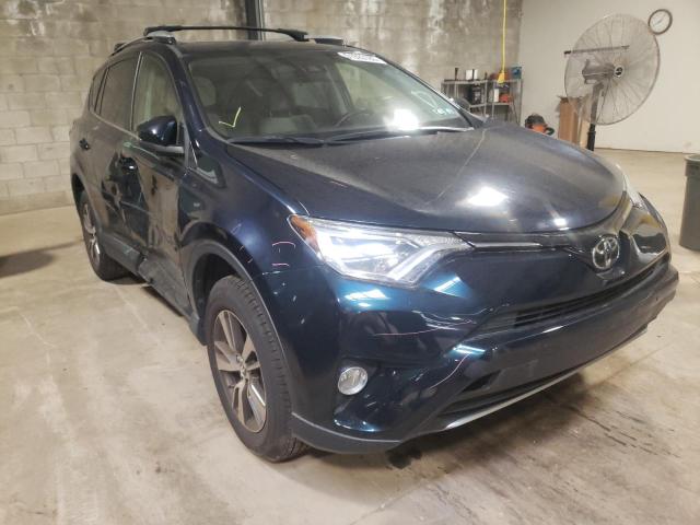 TOYOTA RAV4 XLE 2017 with VIN JTMRFREV0HJ160898 - Photo from auction