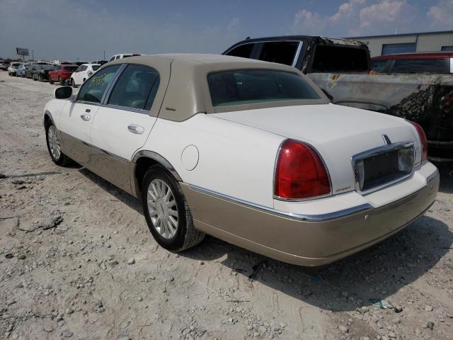 Photo 3 from auction – 2004 LINCOLN TOWN CAR E with VIN 1LNHM81W54Y641463