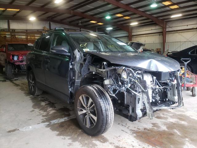 TOYOTA RAV4 XLE 2017 with VIN JTMWFREV9HD106596 - Photo from auction
