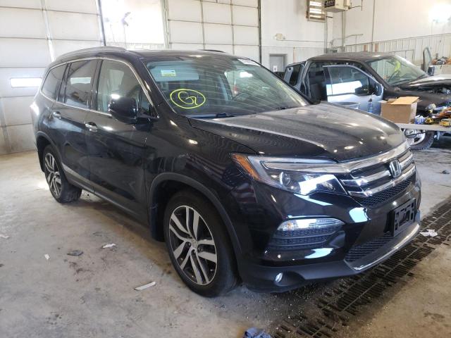 HONDA PILOT ELIT 2017 with VIN 5FNYF6H01HB004936 - Photo from auction