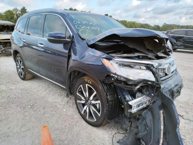 Photo 1 from auction – 2022 HONDA PILOT TOUR with VIN 5FNYF5H60NB019759