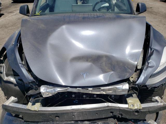 Photo 7 from auction – 2022 TESLA MODEL Y with VIN 7SAYGDEF9NF338432