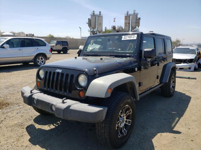 Photo 2 from auction – 2011 JEEP WRANGLER U with VIN 1J4HA6H15BL583337