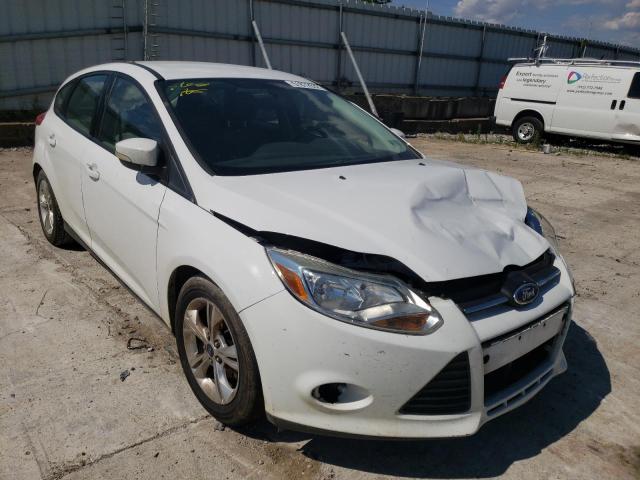 FORD FOCUS SE 2014 with VIN 1FADP3K23EL172015 - Photo from auction