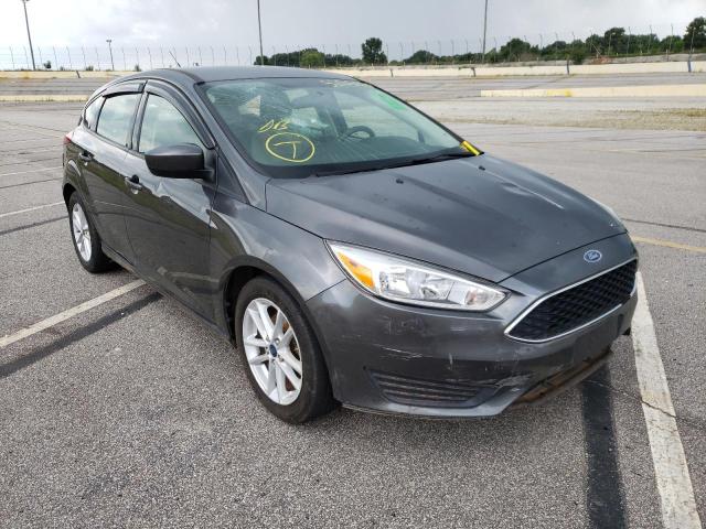 FORD FOCUS SE 2018 with VIN 1FADP3K27JL226507 - Photo from auction