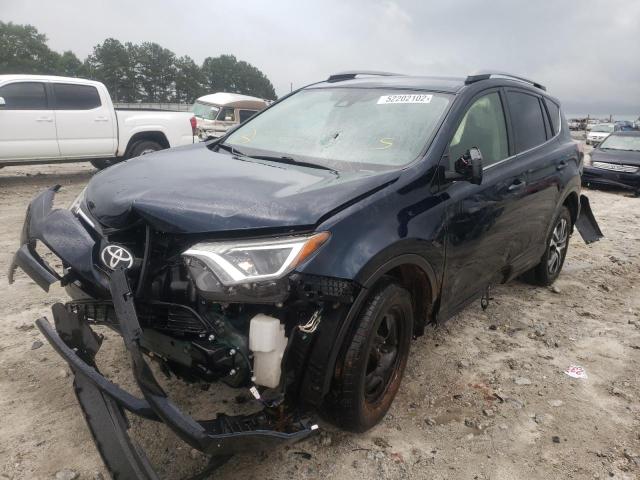 Photo 2 from auction – 2017 TOYOTA RAV4 LE with VIN JTMZFREV2HJ717097