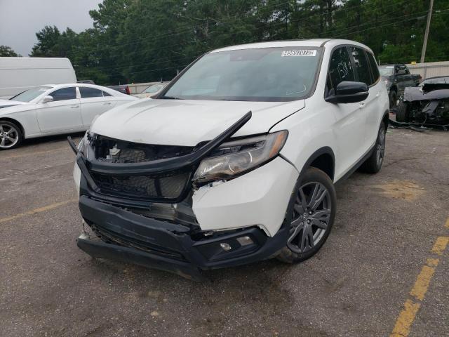 Photo 2 from auction – 2021 HONDA PASSPORT E with VIN 5FNYF7H57MB004709