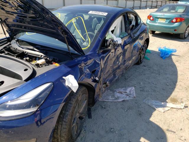 Photo 9 from auction – 2021 TESLA MODEL 3 with VIN 5YJ3E1EB8MF869158
