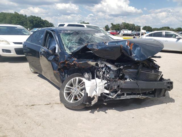 TOYOTA CAMRY LE 2016 with VIN 4T1BF1FK6GU167581 - Photo from auction