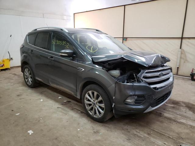 FORD ESCAPE TIT 2017 with VIN 1FMCU9J99HUE22982 - Photo from auction