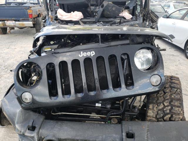 Photo 7 from auction – 2014 JEEP WRANGLER U with VIN 1C4BJWDG7EL218507