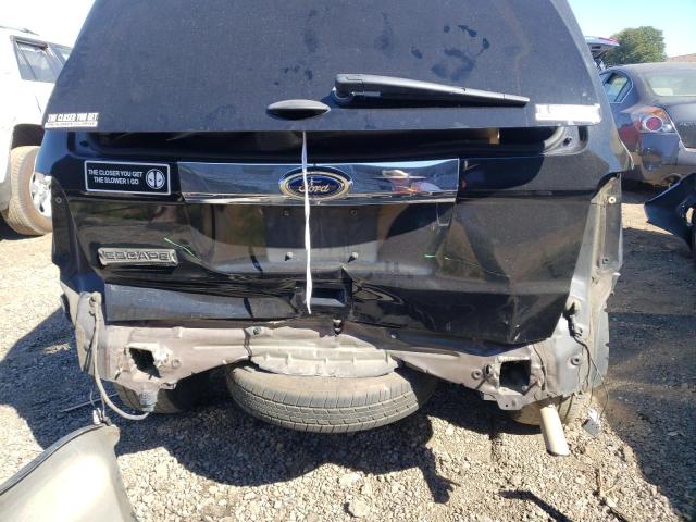Photo 9 from auction – 2011 FORD ESCAPE LIM with VIN 1FMCU0E73BKB54826