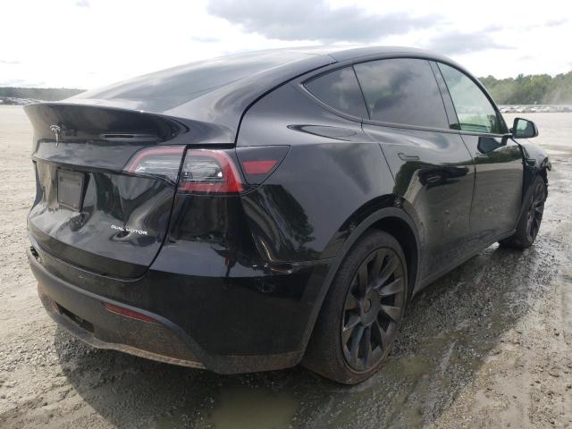 Photo 4 from auction – 2021 TESLA MODEL Y with VIN 5YJYGAEE1MF194084
