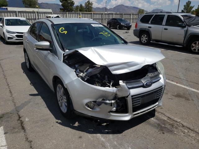 FORD FOCUS SE 2014 with VIN 1FADP3F21EL129979 - Photo from auction