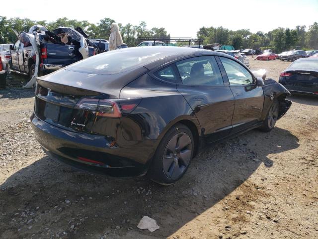 Photo 4 from auction – 2021 TESLA MODEL 3 with VIN 5YJ3E1EB7MF836698