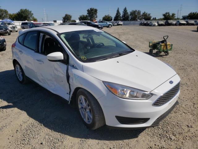 Photo 9 from auction – 2018 FORD FOCUS SE with VIN 1FADP3K20JL304013
