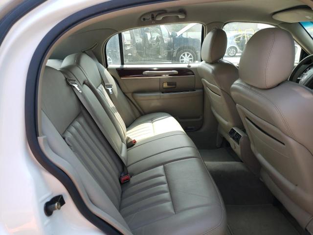 Photo 6 from auction – 2004 LINCOLN TOWN CAR E with VIN 1LNHM81W54Y641463