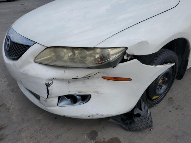 Photo 9 from auction – 2003 MAZDA 6 I with VIN 1YVFP80C335M33876