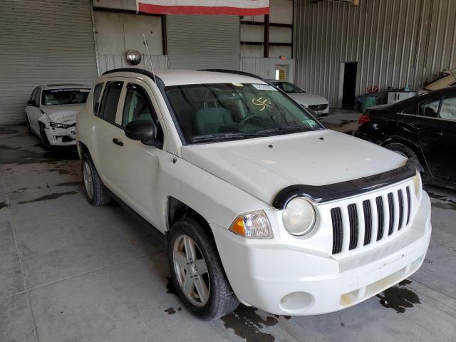 JEEP COMPASS 2007 with VIN 1J8FF47W27D198389 - Photo from auction