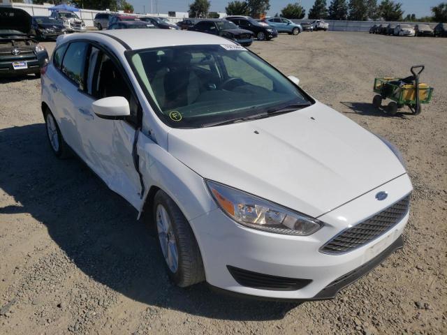 FORD FOCUS SE 2018 with VIN 1FADP3K20JL304013 - Photo from auction