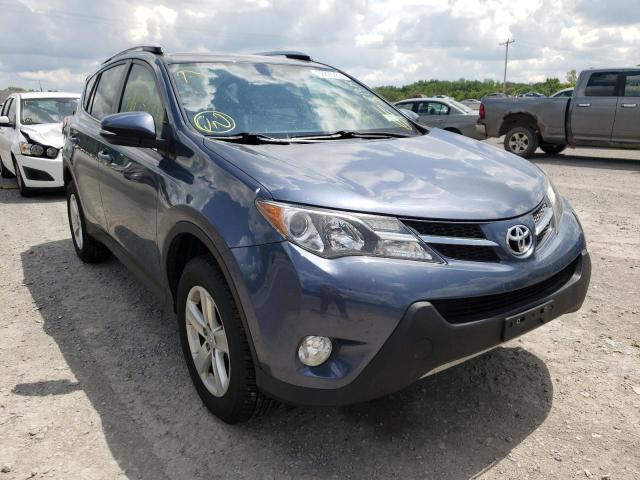 TOYOTA RAV4 XLE 2014 with VIN JTMRFREV1ED072520 - Photo from auction